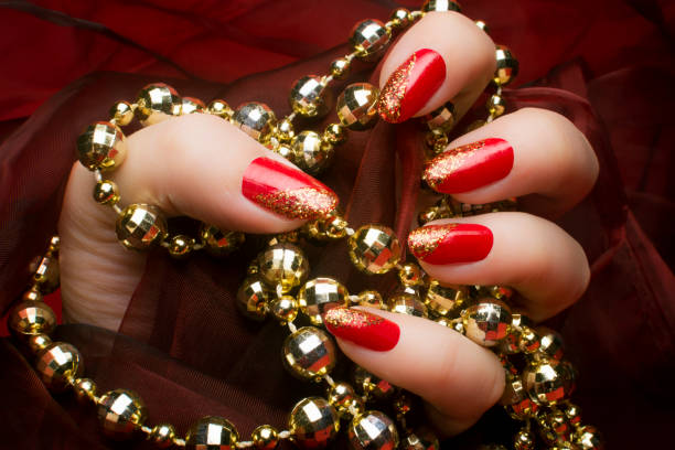 Red Nails with Gold Accents